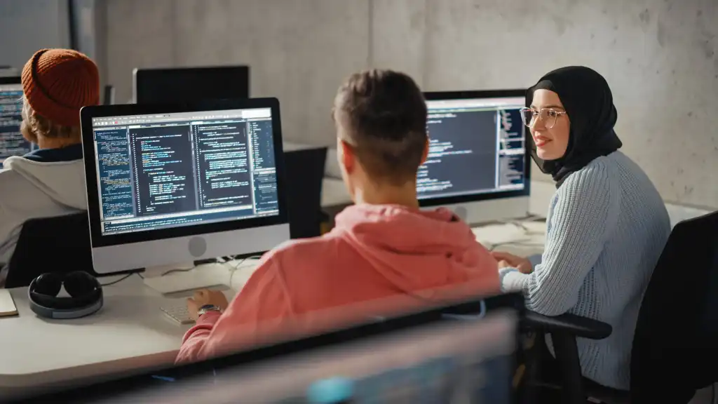 Person looking at a computer screen displaying generative AI certification courses