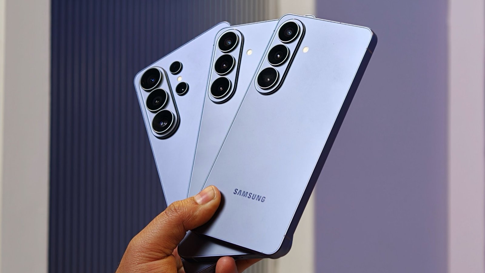 Samsung Galaxy S24 Ultra phone with a stylus, showcasing its camera lenses.