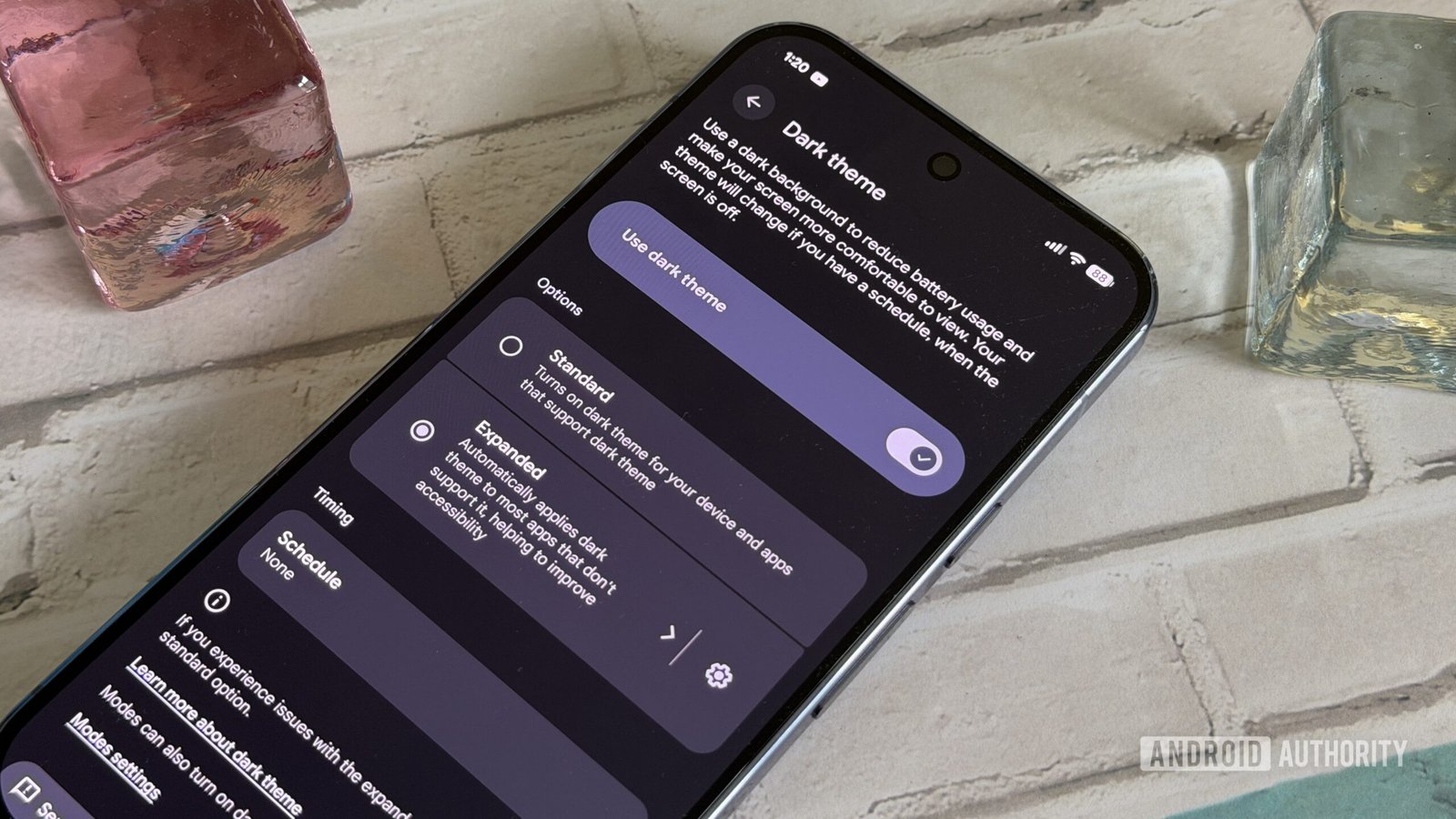 Screenshot of a Google Pixel phone displaying a new secret dark mode setting with a toggle switch.