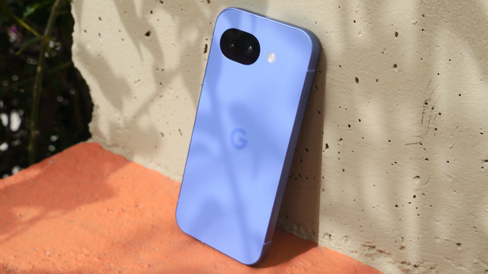 Google Pixel 10a smartphone on a table with a Prime Day sale tag.