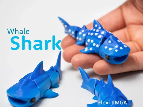 A 3D printed Flexi Whale Shark in a vibrant blue color, showcasing its articulated segments and flexible body.