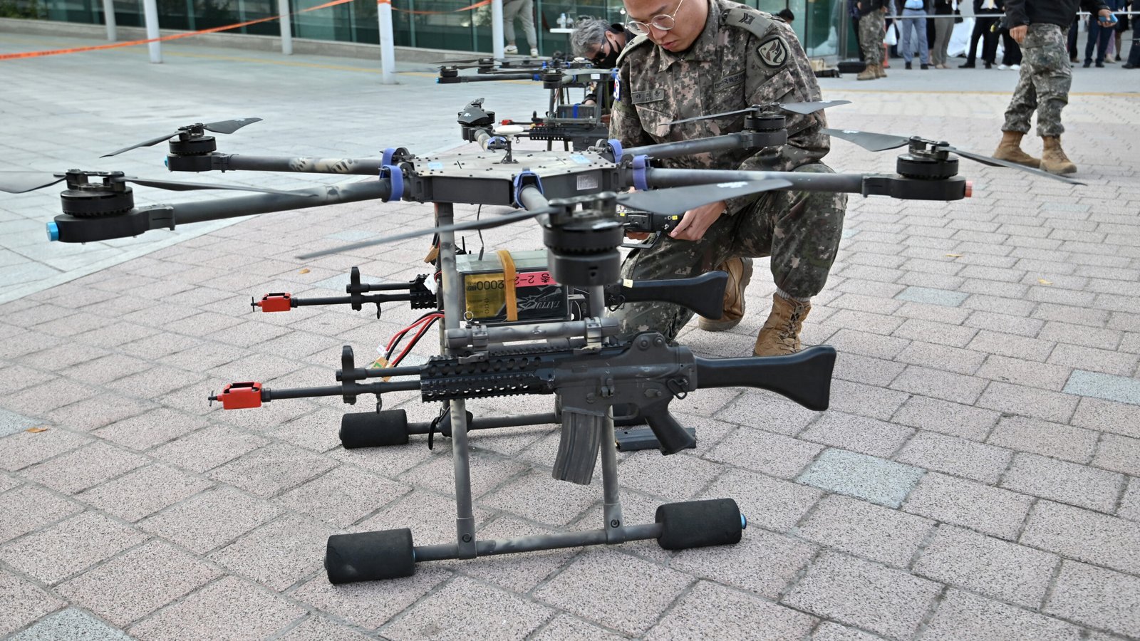 South Korean soldiers practicing with drones as part of a new military drone training program.