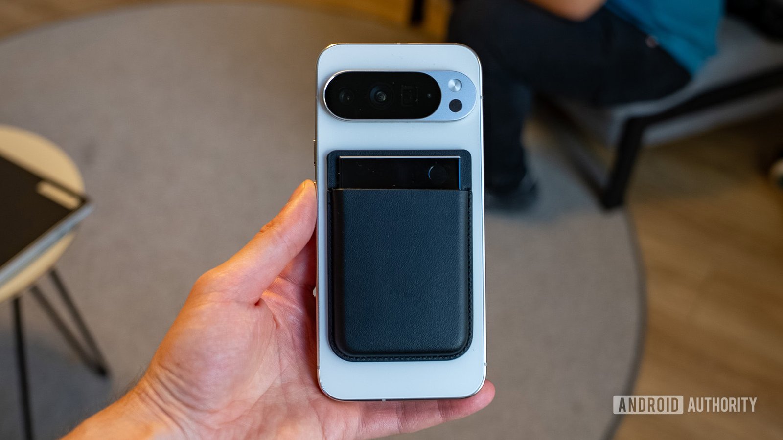 Professional using a sleek, modern productivity gadget on their desk