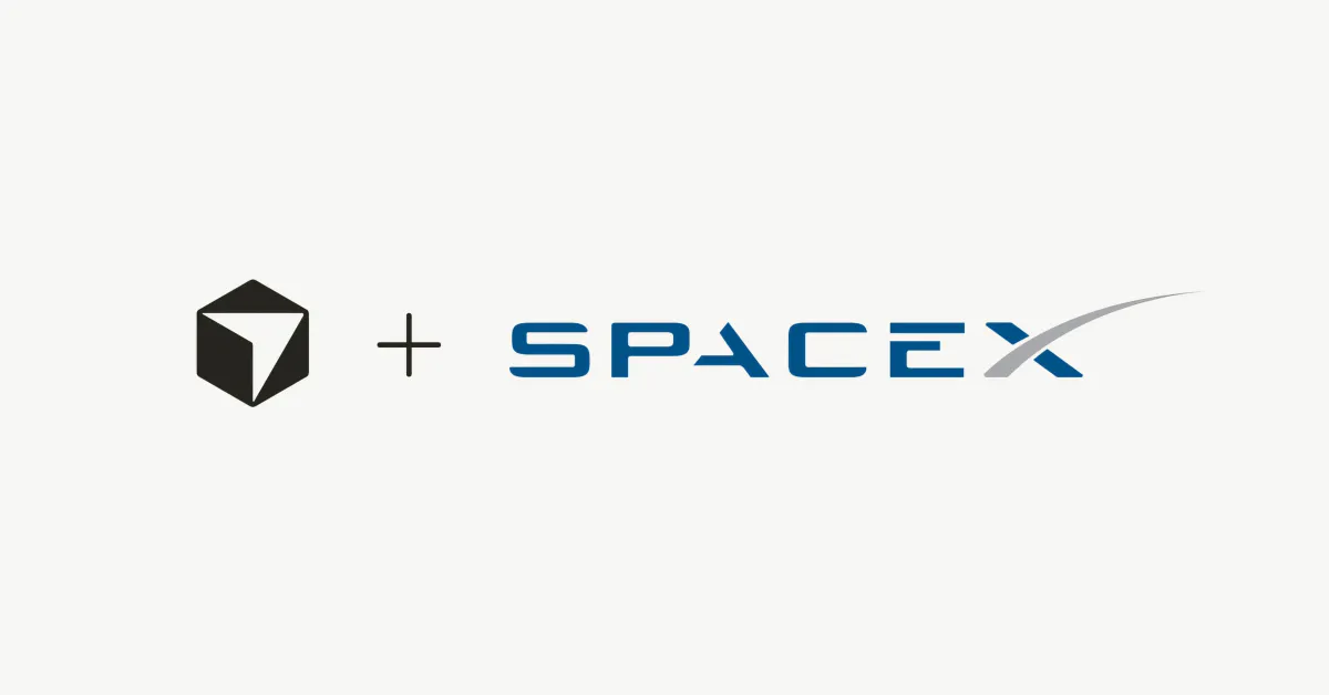 SpaceX CEO Elon Musk at a company event, with the Cursor logo subtly visible.