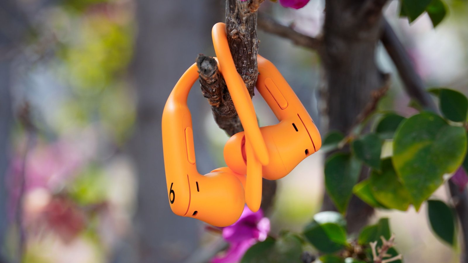 Powerbeats Pro 2 earbuds on a white background with a Prime Day deal graphic.