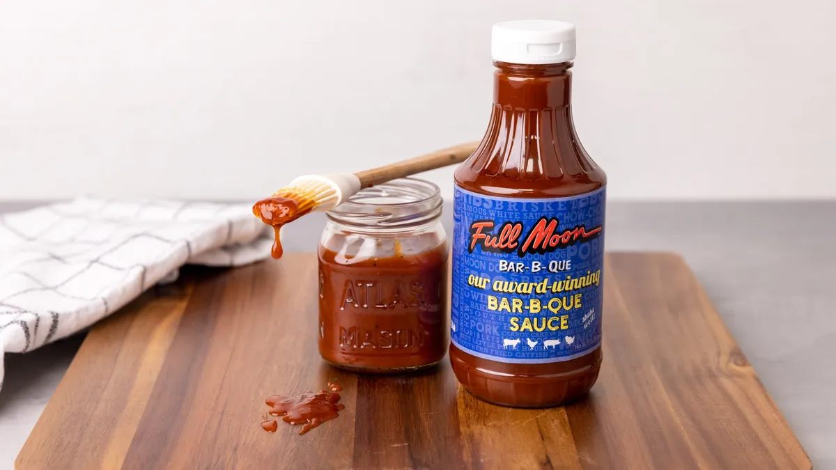 A variety of BBQ sauces lined up for a taste test.