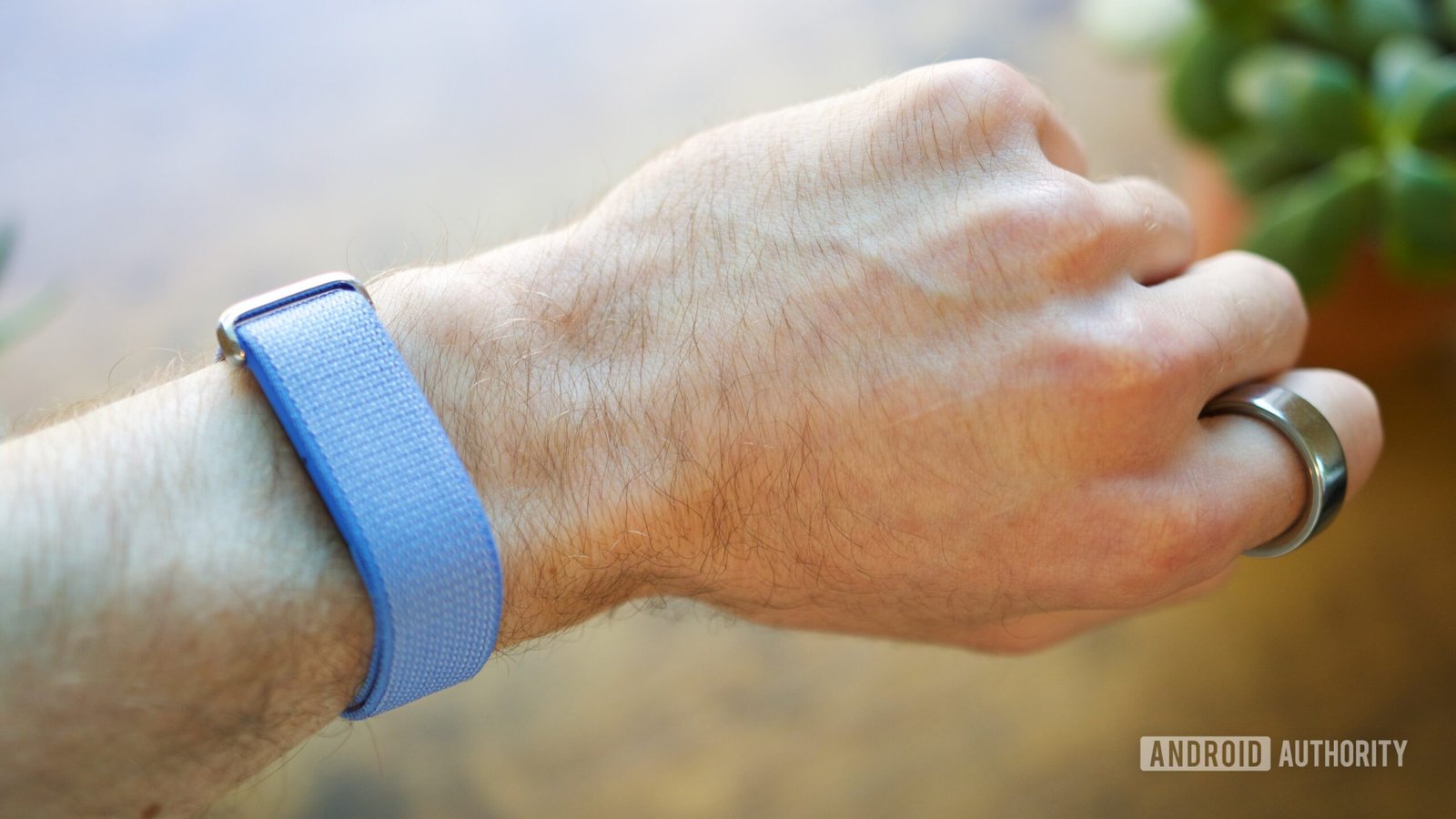 Fitbit Air smartwatch displaying a workout screen