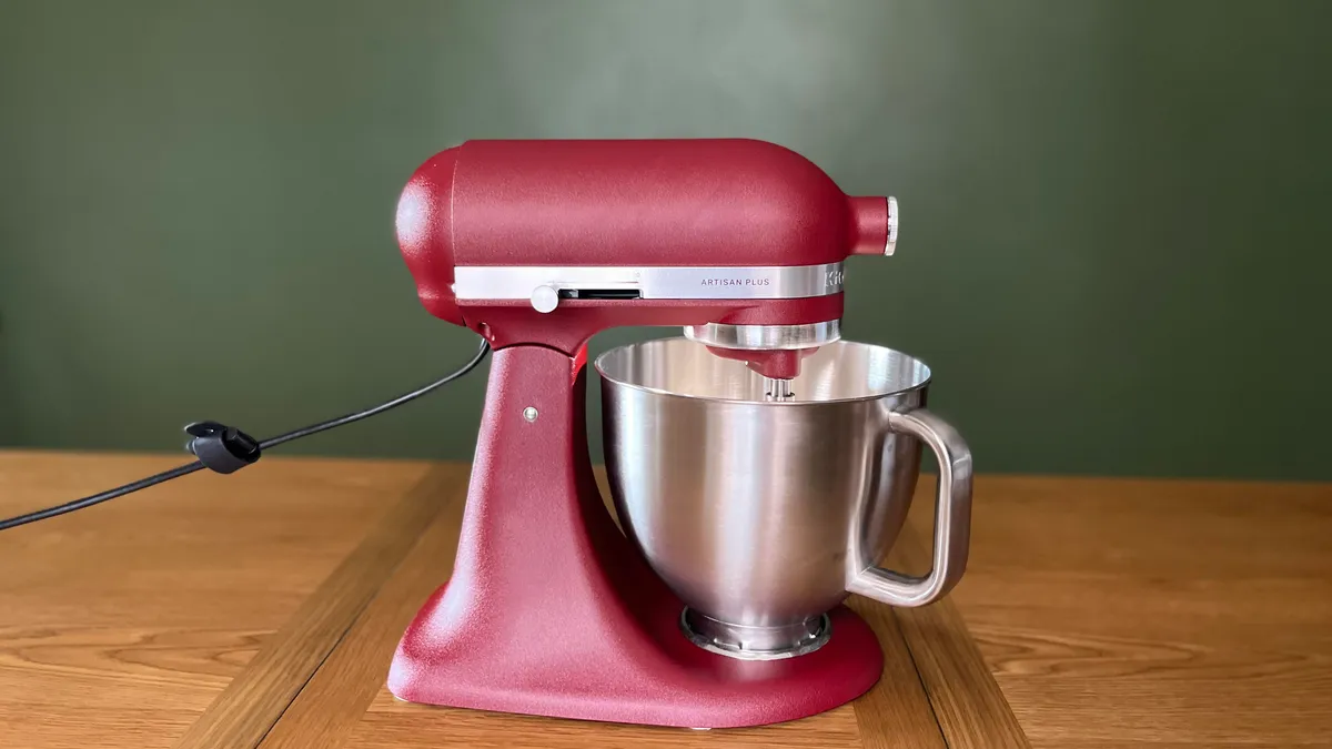 A close-up of a KitchenAid stand mixer with a bowl of batter, showcasing a simple hack for everyday cooking.