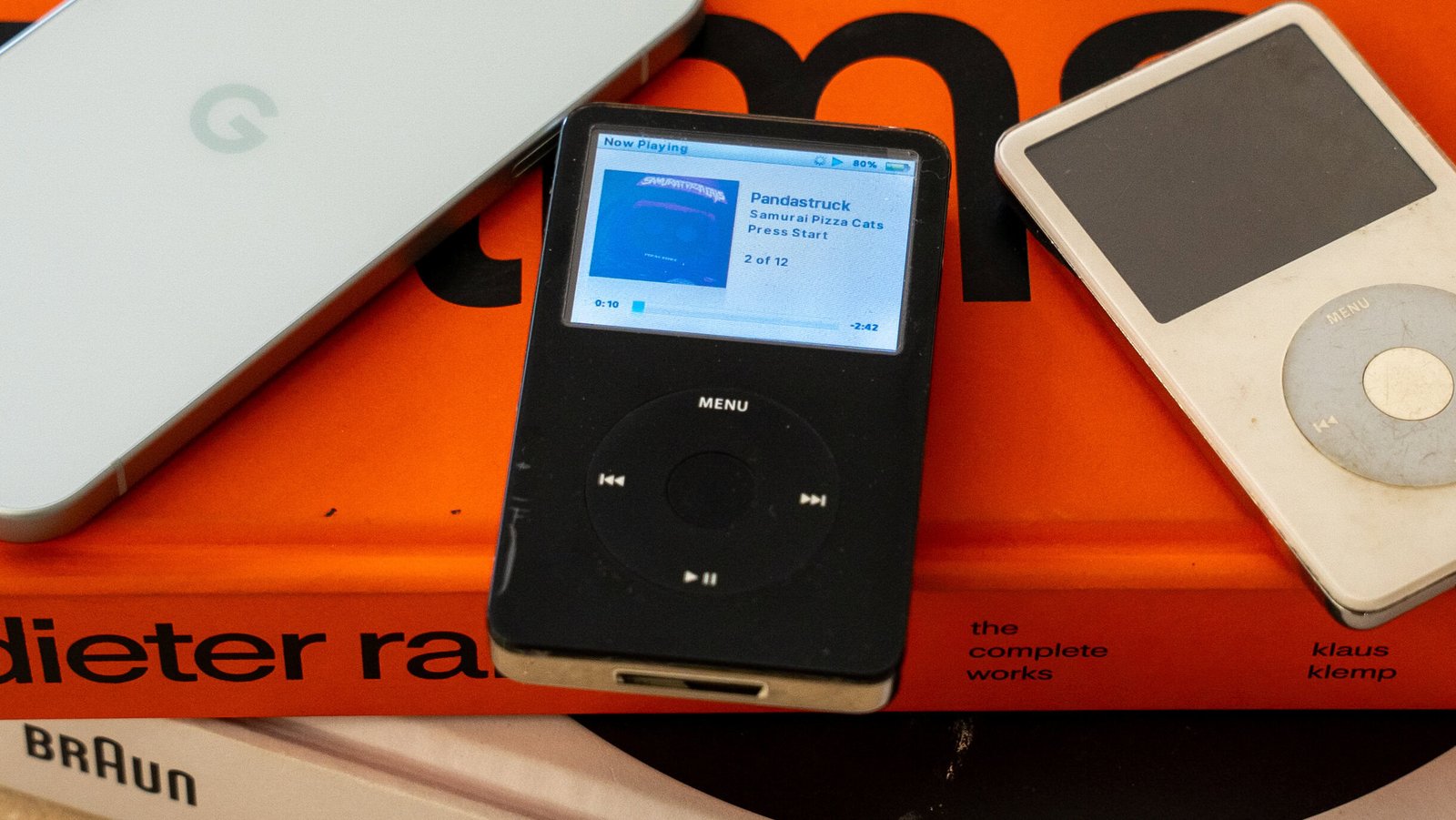 Screenshot of an Android app mimicking the iPod Classic interface on a smartphone screen.