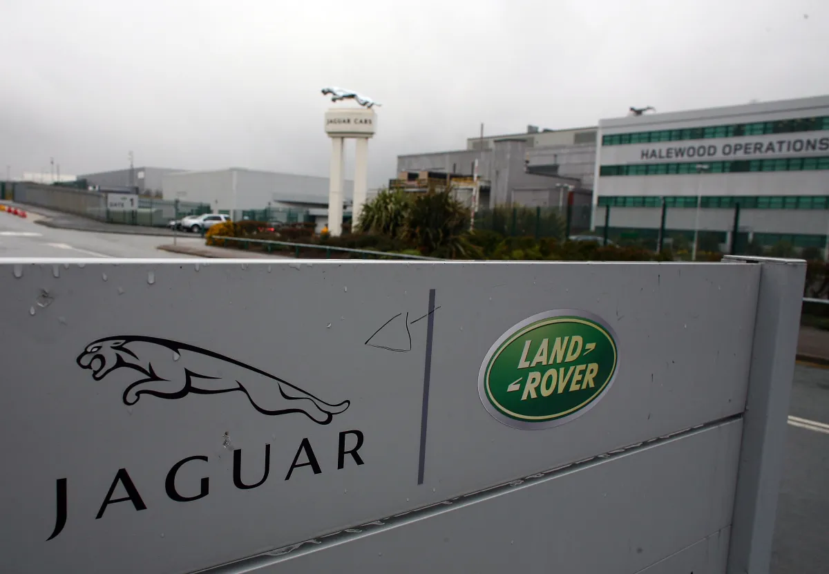 Diagram illustrating the flow of data and potential breach points in a cyberattack on Jaguar Land Rover, highlighting the impact on the UK economy.
