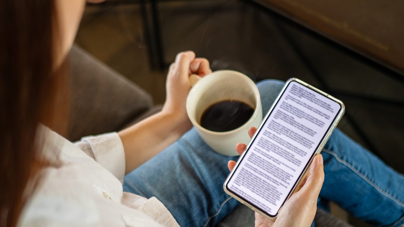Screenshot of the Kindle app on an iOS device showcasing new AI-powered features like summarization and definition lookup.
