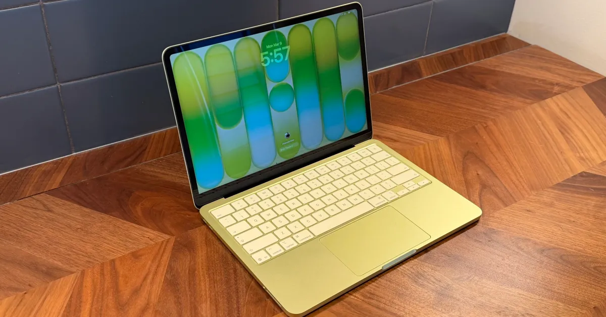 MacBook Pro on a desk with an Amazon Prime Day banner in the background