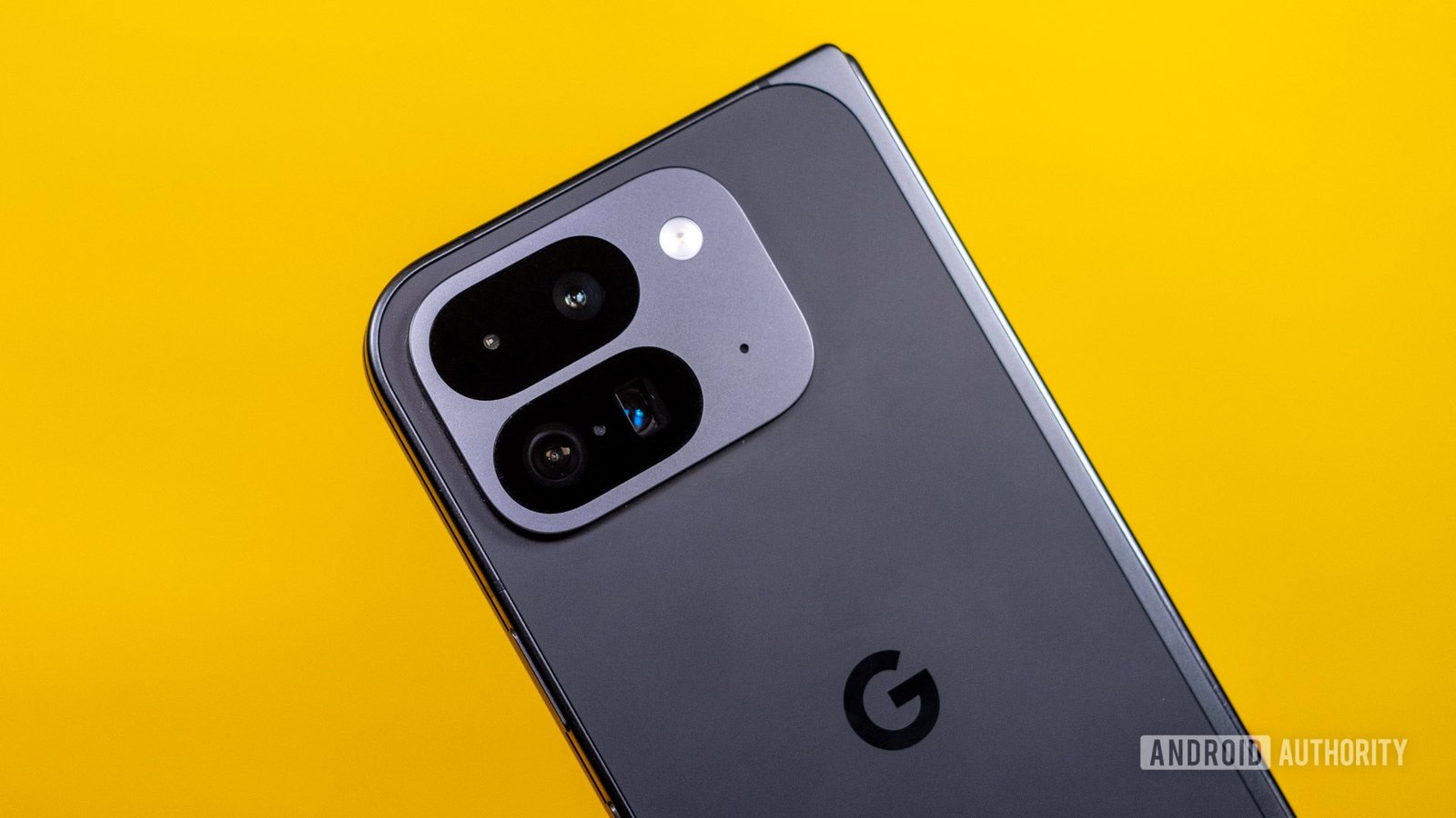 A cracked Google Pixel phone screen with a bill for $660 in the background, symbolizing a denied Pixel repair warranty claim.
