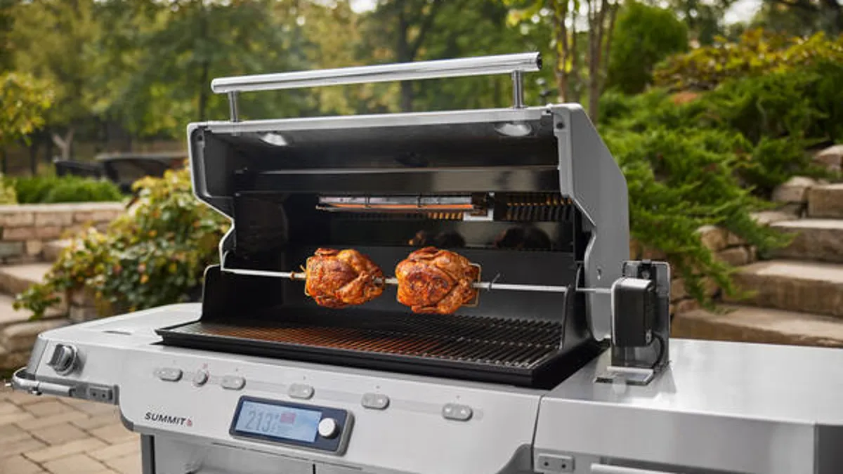 A classic Weber kettle grill with a lid on, showcasing its iconic red color and durable design.