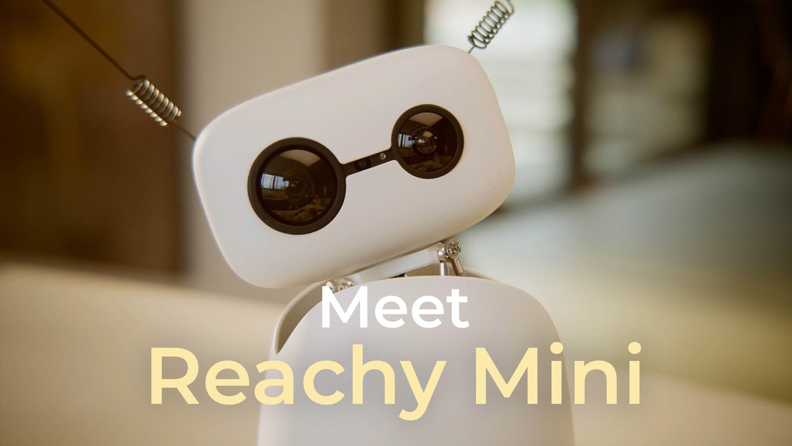 Hugging Face Reachy Mini open-source robot in a lab setting, showcasing its robotic arm and head.