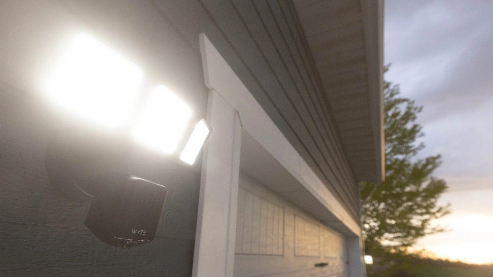 Wyze Floodlight Camera Pro on a dark background, highlighting its features.