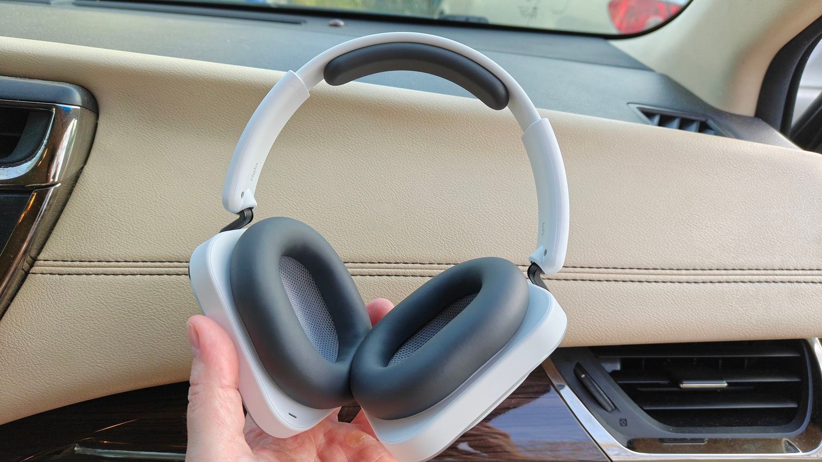 Close-up of various headphones and earbuds displayed on a table, showcasing early Prime Day deals.